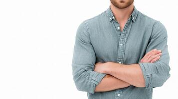 A man with his arms crossed standing with his shirt open photo