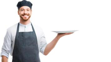 A man in an apron holding a plate photo