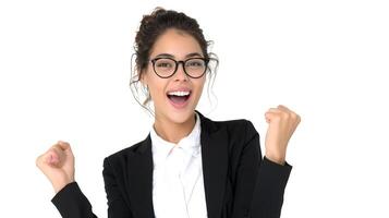 A woman in a suit and glasses is celebrating photo