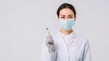 A woman in a white lab coat holding a toothbrush photo