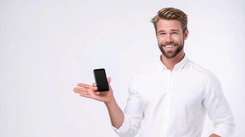 A man holding a cell phone in his hand photo