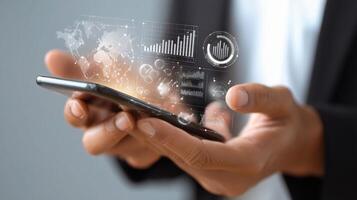 Businessman using smartphone with business icons photo