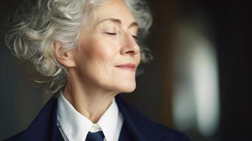 An older woman with her eyes closed photo
