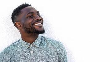 A man is smiling and looking up photo
