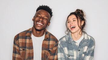 A man and woman are laughing together photo
