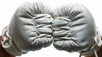 A pair of white boxing gloves photo