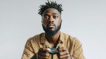 A man with dreadlocks holding a game controller photo