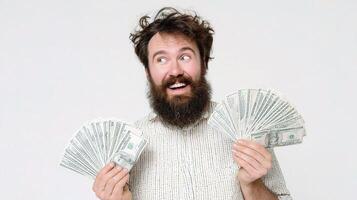 A bearded man holding up two dollars photo