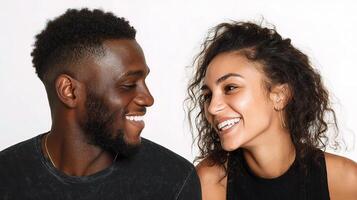 A man and woman smiling at each other photo