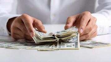 A person holding a bundle of money photo