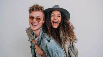 A young couple is laughing and smiling photo