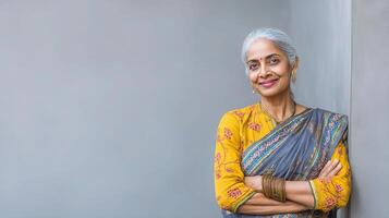 An older indian woman in a sari photo