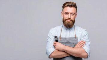A bearded man with a beard and apron holding a bottle of hair product photo