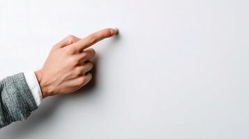 A person pointing at a white board photo