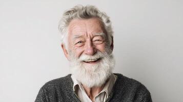 An old man with a white beard and a smile photo