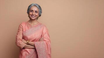 An older indian woman in a pink sari photo