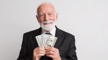An old man in a suit holding money photo