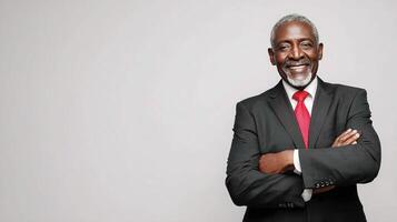 An older black man in a suit and tie photo