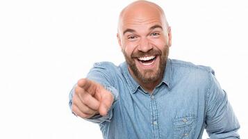 A bald man with a beard pointing at something photo