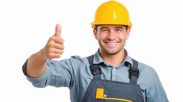 A man in a hard hat and overalls giving the thumbs up photo
