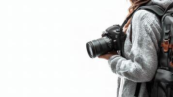 A woman with a camera and backpack photo
