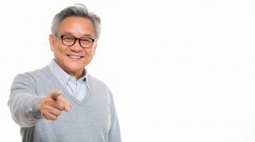 An older man in glasses pointing at something photo