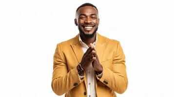 A man in a suit is smiling and clapping photo