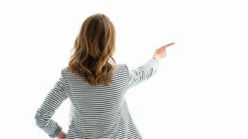 A woman in striped shirt pointing at something photo