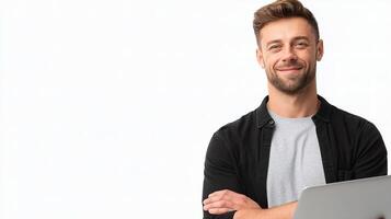 A man with a laptop standing in front of a white background photo