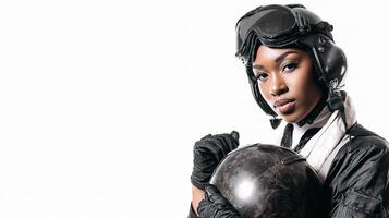 A woman in a helmet and gloves holding a ball photo