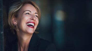 A woman smiling with her mouth open photo