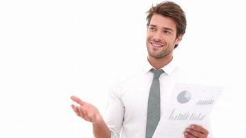A man in a shirt and tie is holding a piece of paper photo