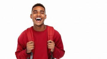 A young man is smiling and holding a backpack photo