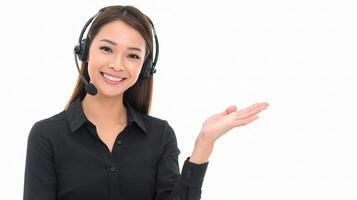 A woman wearing a headset and pointing to the side photo