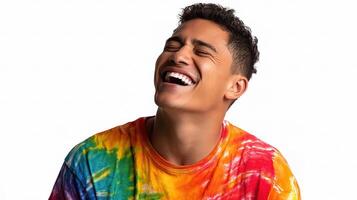 A man laughing while wearing a tie dye shirt photo
