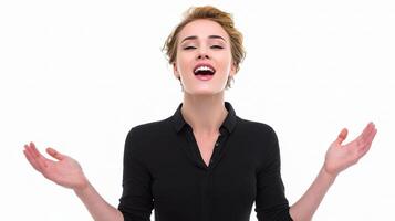 A woman is laughing and holding her hands up photo