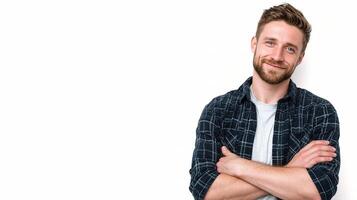 A man with a beard and shirt is smiling photo