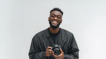 A man with a camera smiling photo