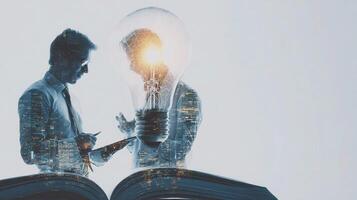 Business people in a book with light bulb concept photo