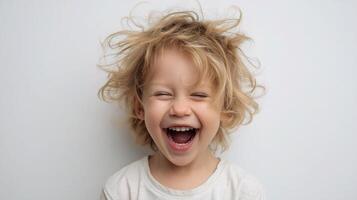 A young child with a big smile photo