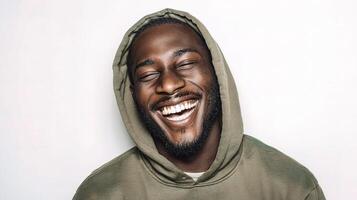 A man with a hoodie on laughing photo