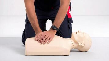 A person is kneeling down to place their hand on a dummy photo