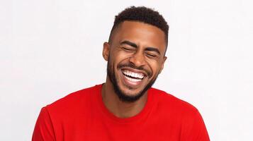 A man in a red shirt is laughing photo