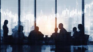 Business people in front of a window with a stock chart photo