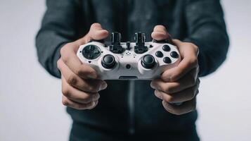 A person holding a game controller photo