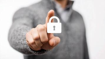 A man is holding a padlock with a white icon photo