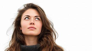 A woman looking up with her eyes closed photo