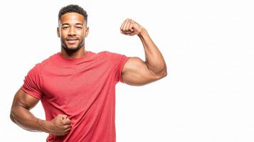 A man flexing his muscles in a red shirt photo