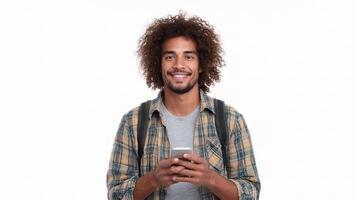 A man with curly hair holding a cell phone photo