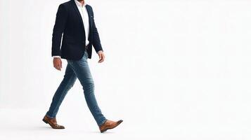 A man in a suit and tie walking photo